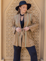 Camel suede wrap jacket with embroidered trim and belt, open front, bell sleeves.