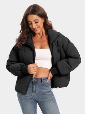 Black padded bomber jacket with ribbed cuffs and a high collar.