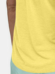Yellow racerback tank top with textured fabric detail