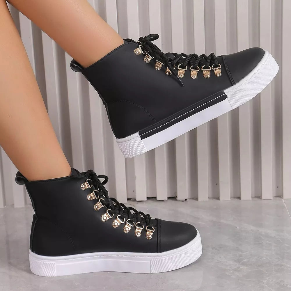 Black lace-up platform sneakers with D-ring eyelets and white soles.