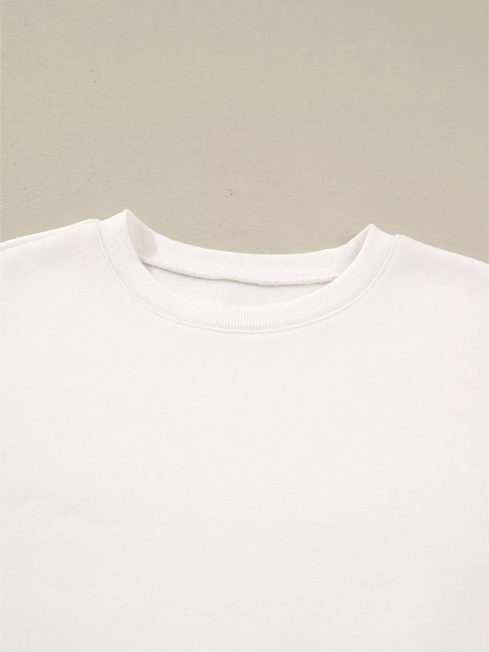 White cotton pullover pajama top with crew neck and ribbed trim