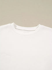 White cotton pullover pajama top with crew neck and ribbed trim