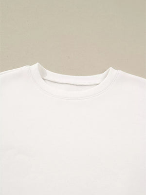 White cotton pullover pajama top with crew neck and ribbed trim