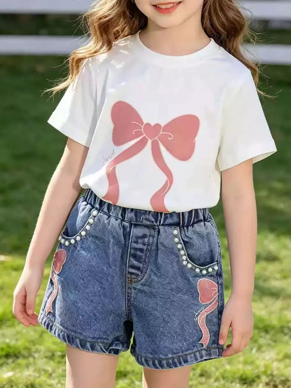 Charming bowknot tee and denim shorts set in beige, white, or blush pink with bead embellishments.