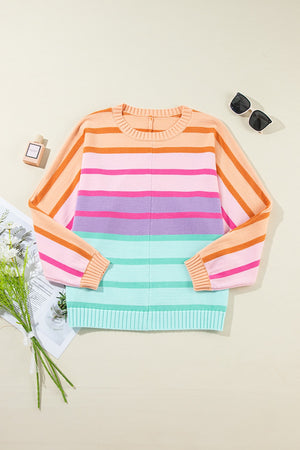 Ombre stripe knit sweater with crew neck and ribbed cuffs in Sherbet and Turquoise colors.