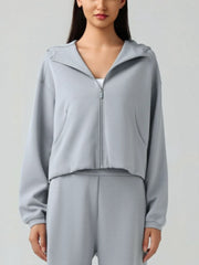 Gray cropped active zip-up hoodie with raglan sleeves and pockets