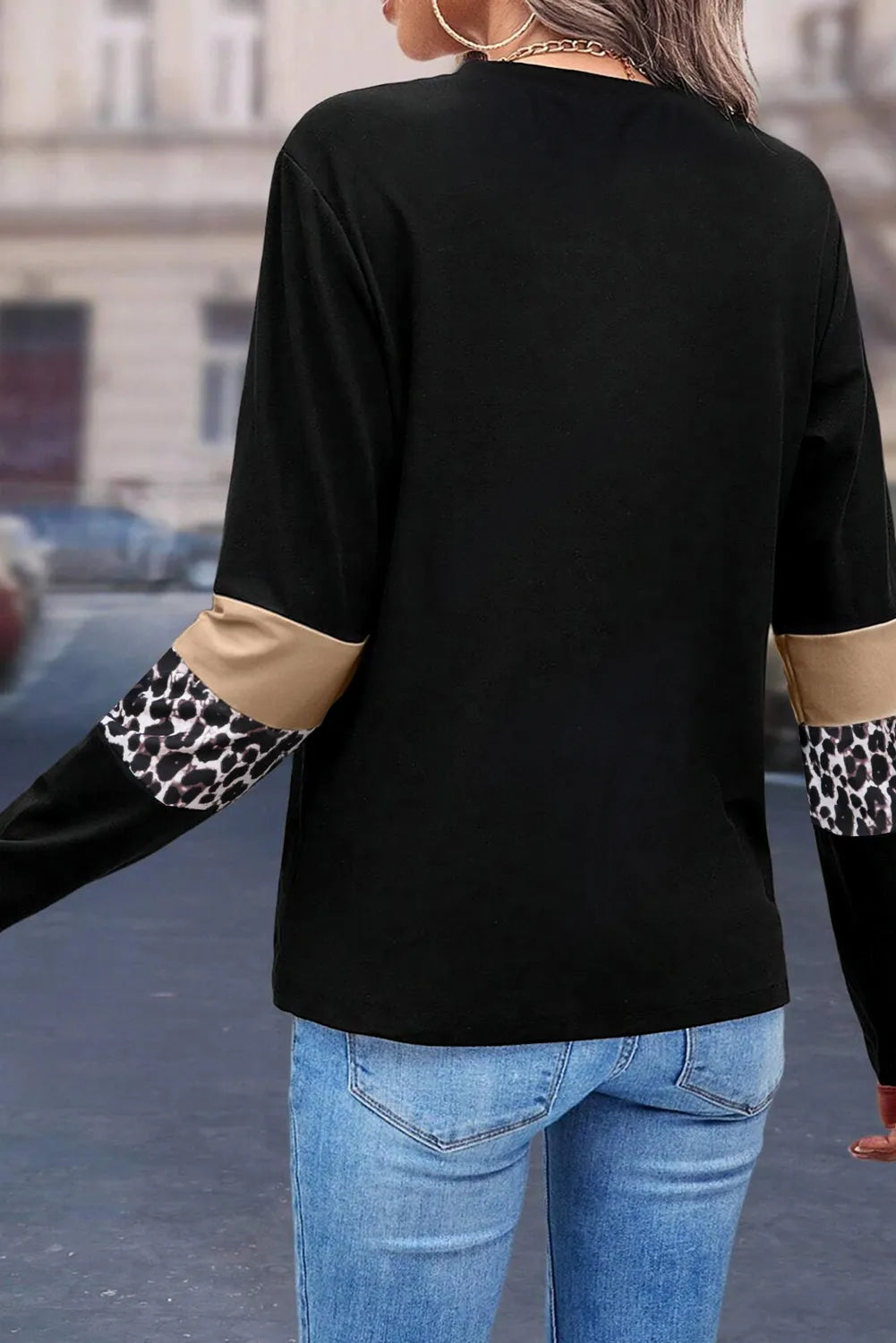 Black long sleeve tee with tan and leopard print sleeve panels.
