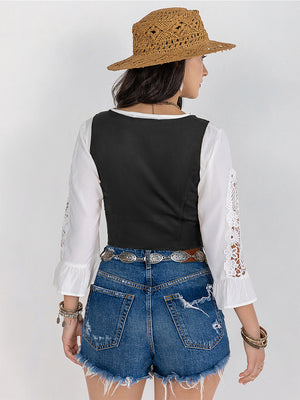 Black lace-up corset vest with white peasant sleeves and lace trim.