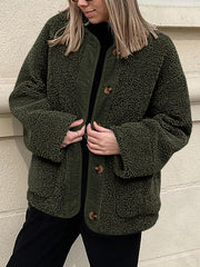 Teddy-texture button-up jacket in Black Forest with corduroy trim and button closure.