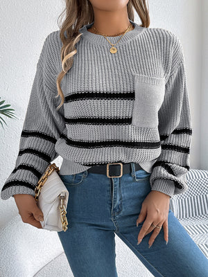 Gray striped knit sweater with a chest pocket and crew neck.