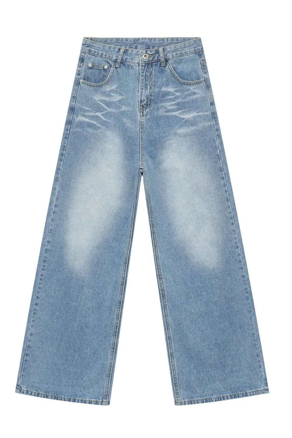Oversized medium wash denim jeans with distressed details and wide leg.