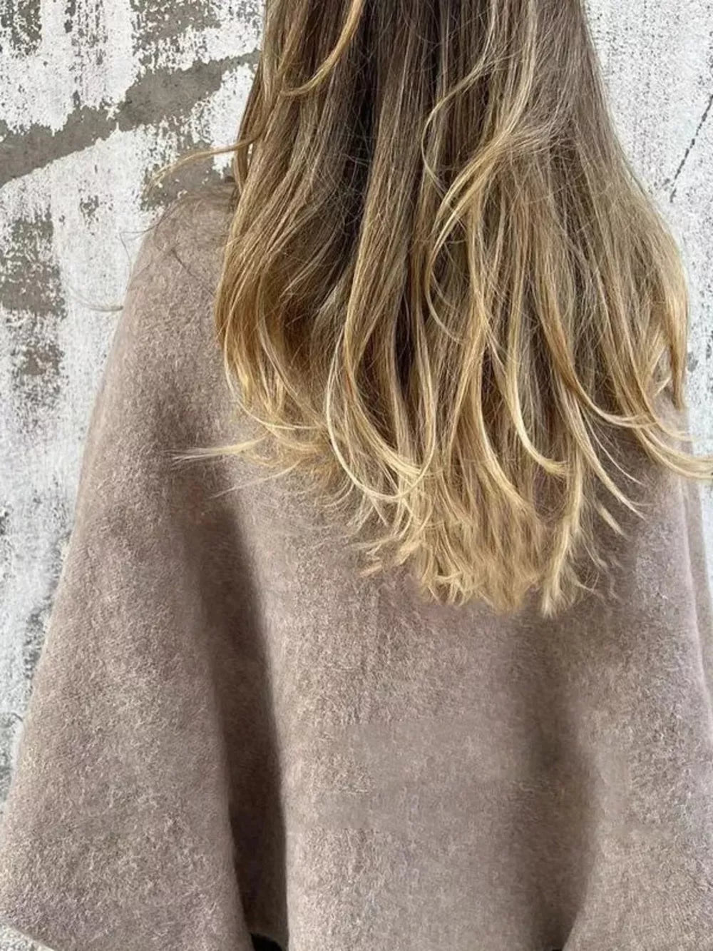 Cozy fuzzy knit cardigan in Khaki with button detail, shown from the back.