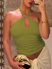 Green halter cami with crisscross detail and keyhole accent, gold ring detail.