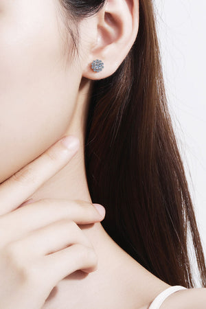 Silver floral halo stud earrings made of 925 sterling silver with a blossom design.