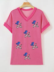 Pink striped V-neck tee with patriotic sequin balloon dog graphic and elastane blend.