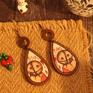 Sam Trick or Treat wood earrings with painted character detail and copper hooks.