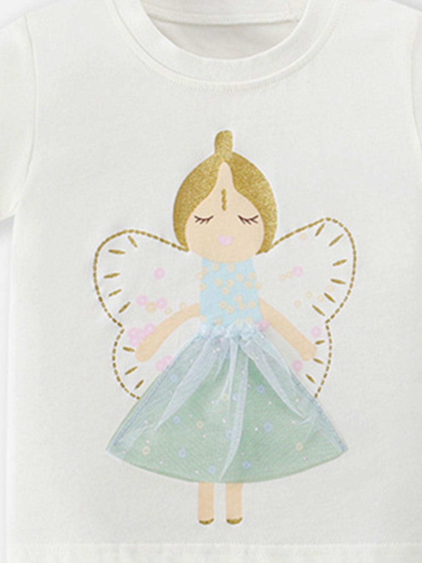 White cotton toddler tee with fairy graphic, gold glitter hair, blue floral dress, and sheer mint skirt.