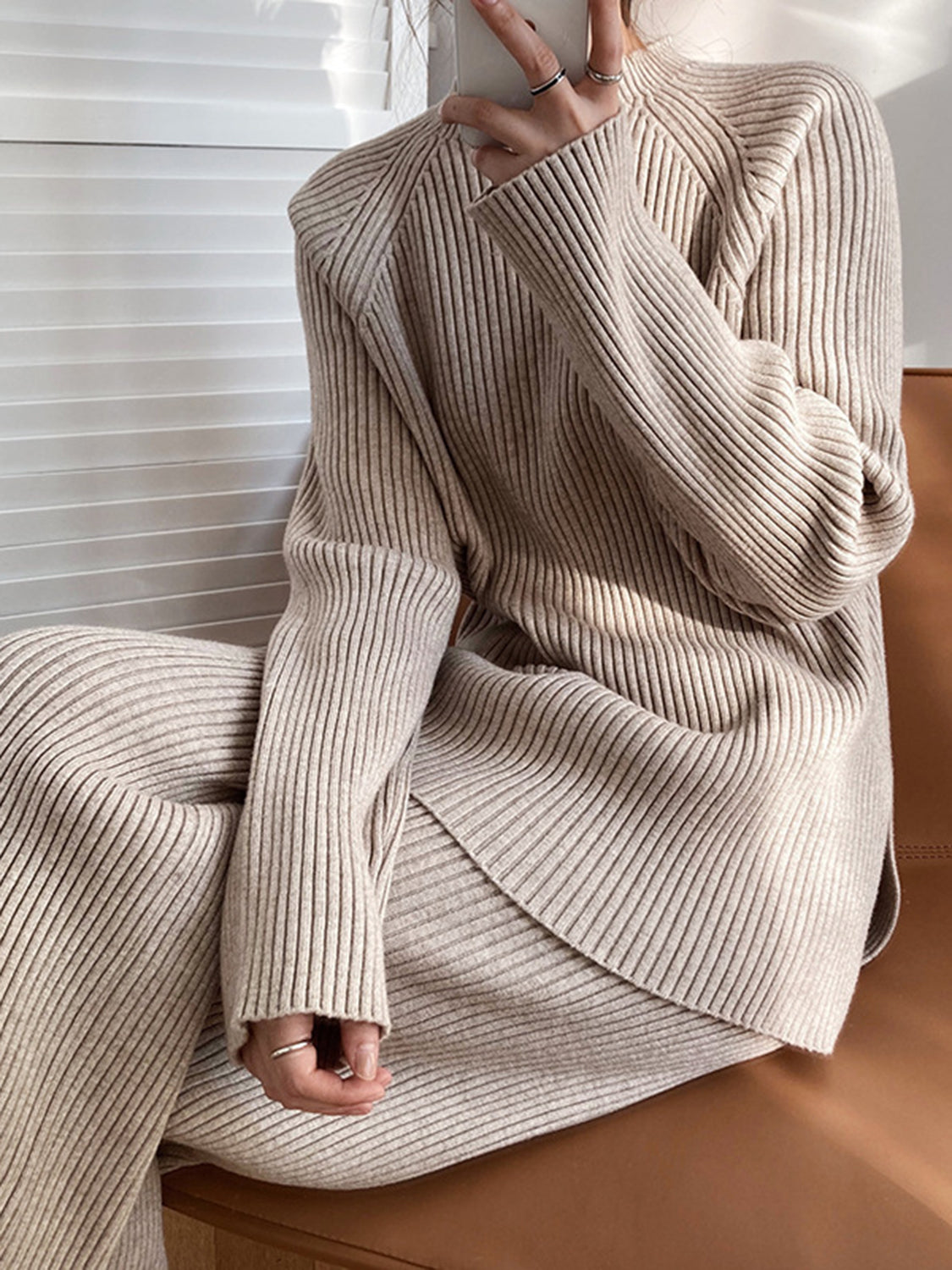 Asymmetric ribbed knit co-ord set in Dust Storm acrylic, featuring a mock neck and wide-leg pants.