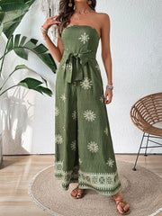 Matcha green bandeau jumpsuit with white embroidery and wide legs, tied waist.