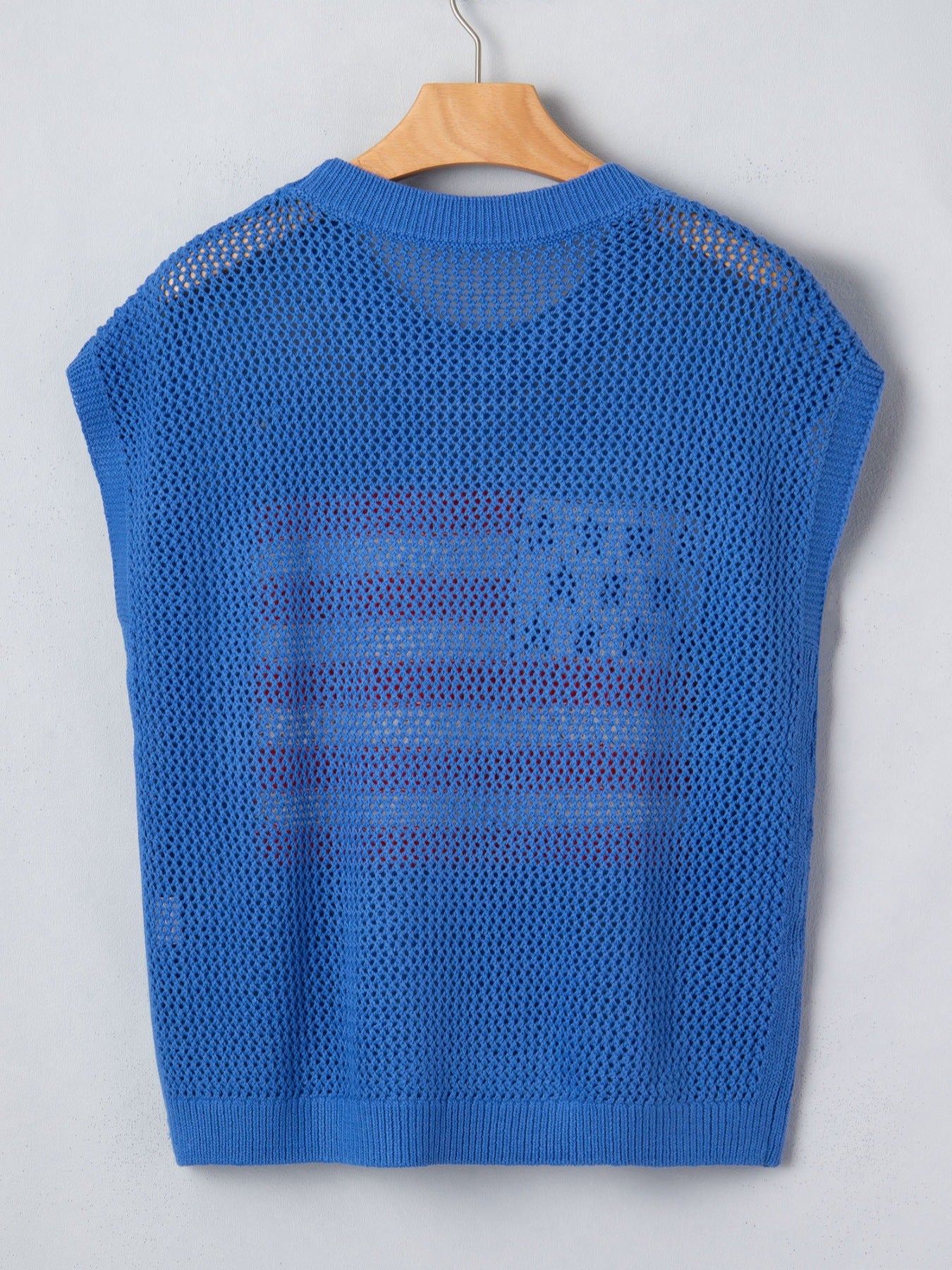 Blue acrylic knit top with an American flag graphic, crew neck, and sleeveless design.