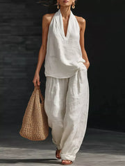 White halter neck top with flowing wide-leg pants set, casual breezy women's outfit