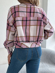 Cropped plaid shacket in dusty pink with gathered sleeves and elastic hem.