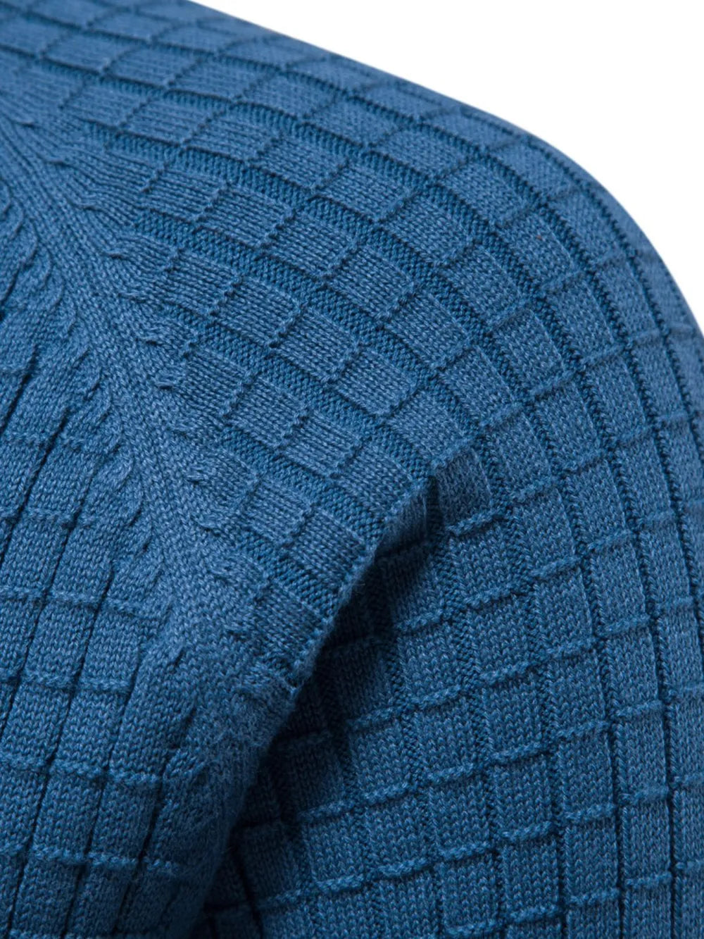 Textured grid crewneck sweater in Peacock Blue with ribbed detailing on the shoulder.