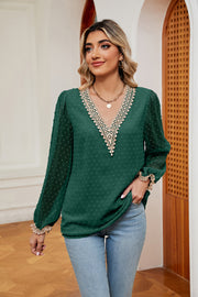 Green Swiss dot blouse with embroidered V-neck and poet sleeves