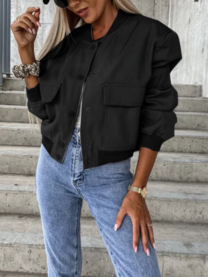 Black faux leather bomber jacket with sculpted sleeves and chest pockets.