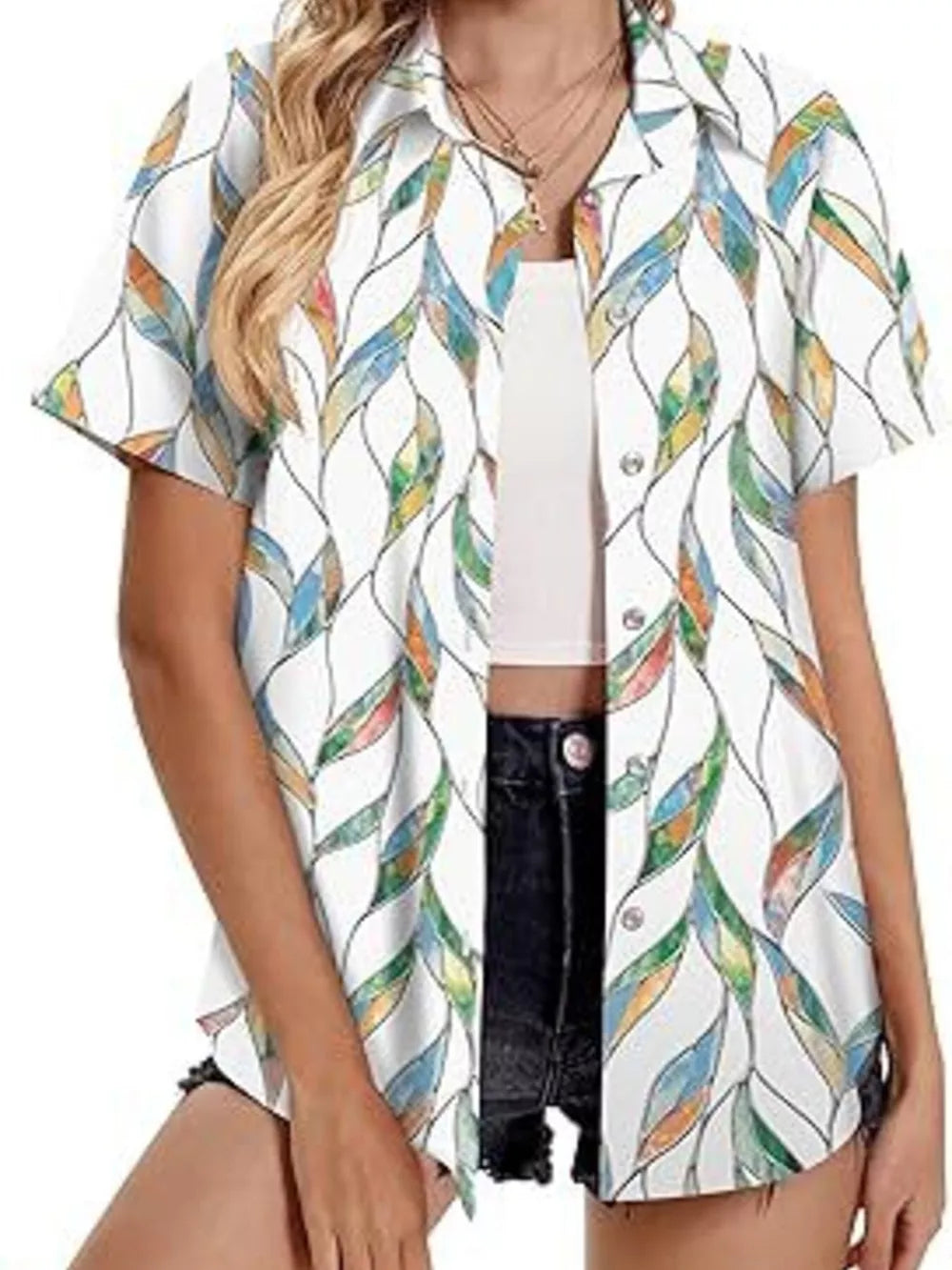 White short sleeve button-up shirt with a colorful leaf print.