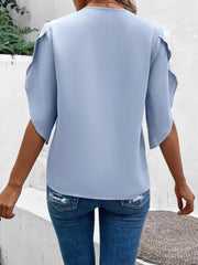 Light blue flutter sleeve blouse with scalloped lace trim detail