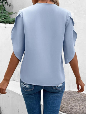 Light blue flutter sleeve blouse with scalloped lace trim detail
