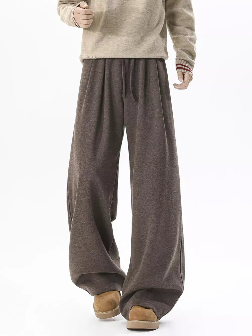 Brown wide-leg sweatpants with adjustable drawstring waist and relaxed fit.