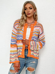 Orange chevron knit cardigan with open crochet details and button front.