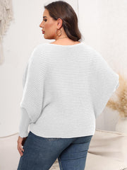 White ribbed knit off-shoulder sweater with batwing sleeves.