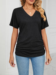Relaxed grey V-neck short sleeve t-shirt with ruched sides.