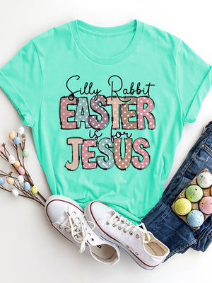 Aqua Easter graphic tee with pastel polka dot letters and "Silly Rabbit Easter is for Jesus" text.