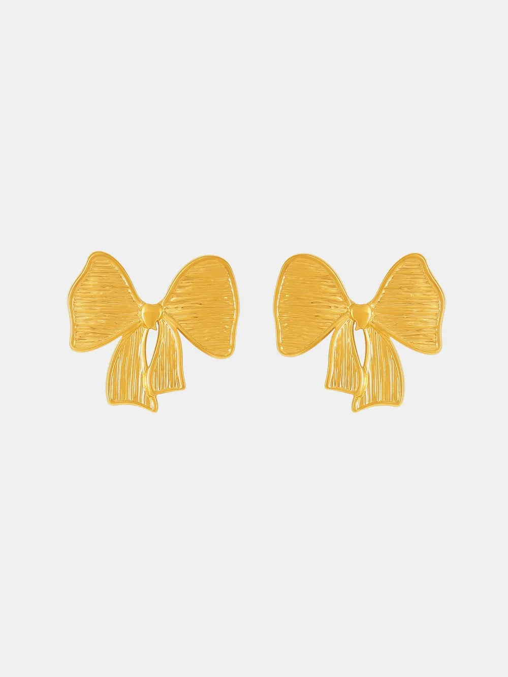 Sculpted bow earrings in 18K gold with textured detail.