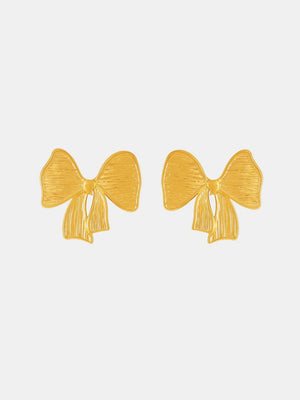 Sculpted bow earrings in 18K gold with textured detail.