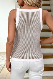 Ribbed knit sweater vest with contrast trim and vertical stripes.