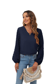 Dark Navy V-neck blouse with textured pom-pom balloon sleeves.