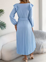 Blue midi dress with ruffled shoulders, long sleeves, belted waist, and pleated skirt.