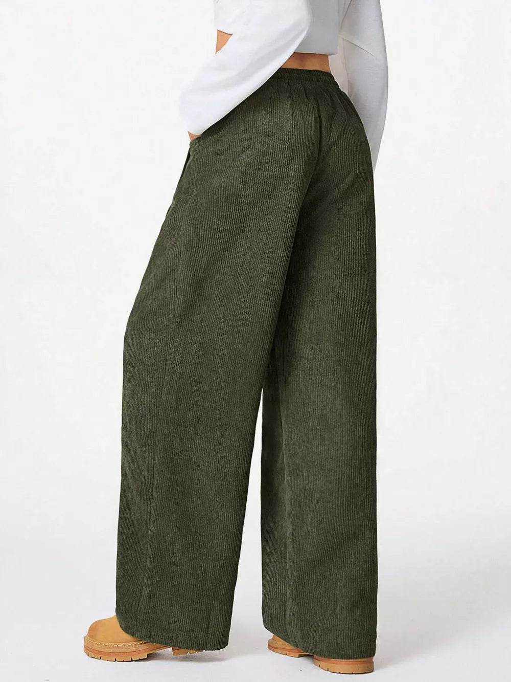 Army green corduroy maternity trousers with wide legs and pockets.