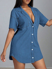 Medium wash denim oversized shirt dress with plunge neckline and button front.
