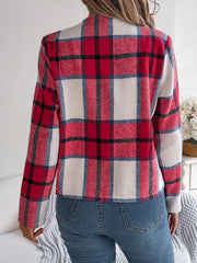Collarless plaid cropped jacket in red, white, and blue plaid.