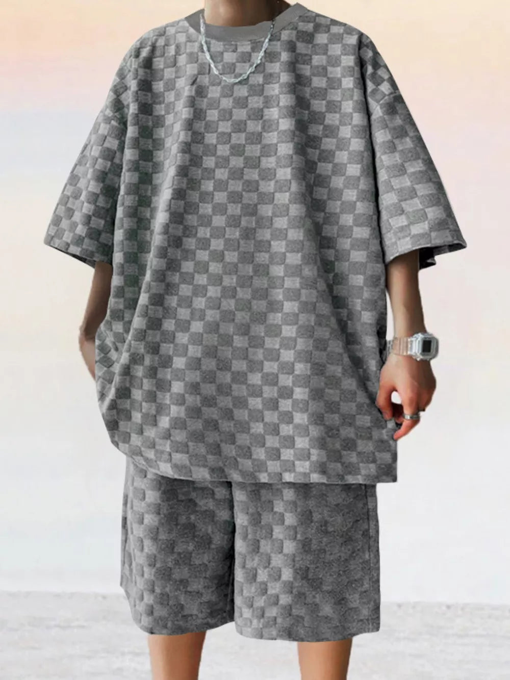 Dark gray checkered textured casual two-piece set for men.