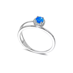 Silver ring with iridescent blue opal and diamond halo on double band