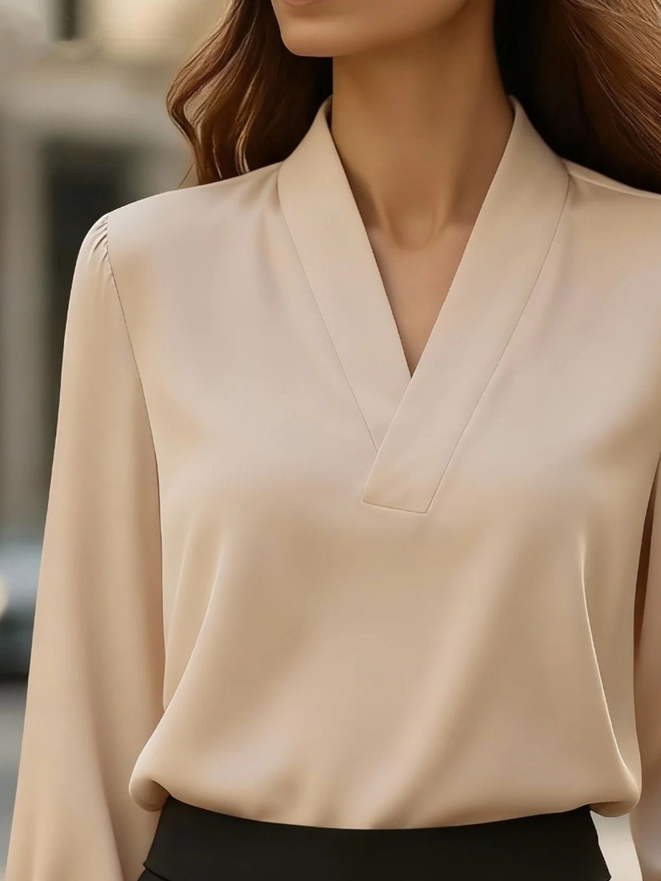 Beige satin v-neck blouse with subtle shoulder detail