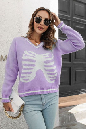 Lavender knit sweater with white ribcage graphic, V-neck, and striped cuffs.