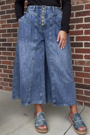 Maternity wide-leg jeans in blue denim with button-fly and high waist.